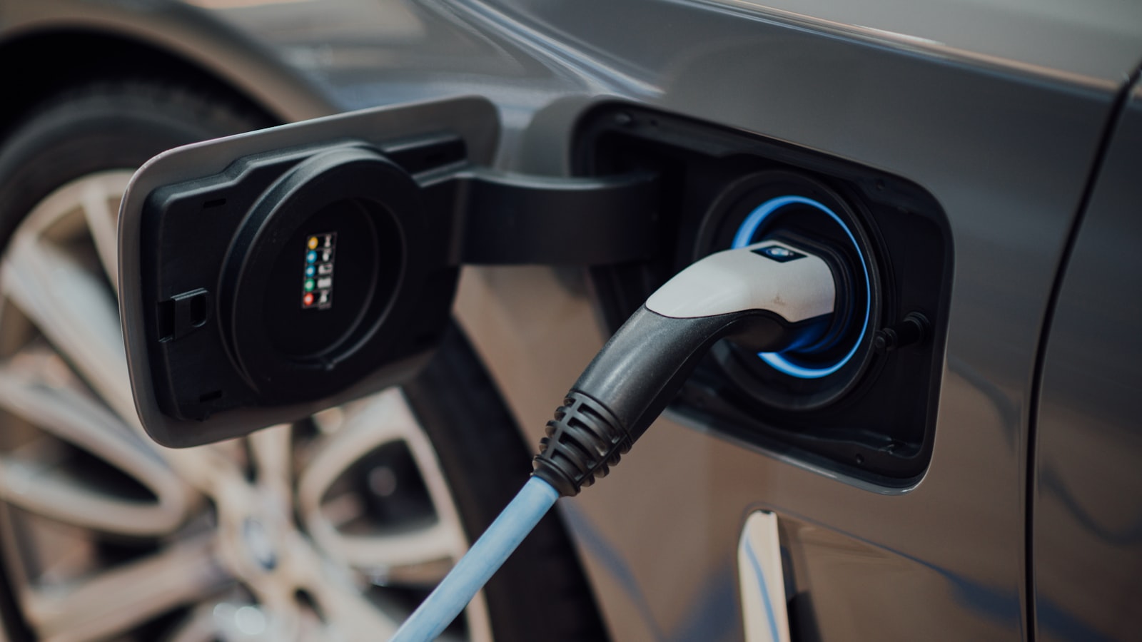Electric vehicle connected to a charging cable